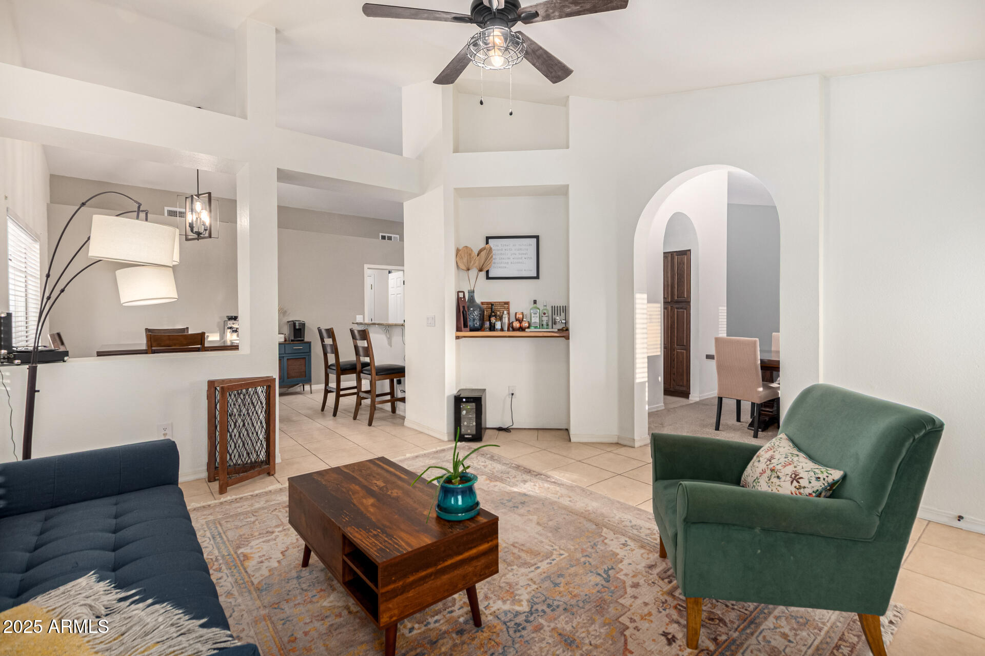 2646 North Robin Lane Mesa, AZ 85213 - Photo 18 of 45 a living room with furniture and view of kitchen