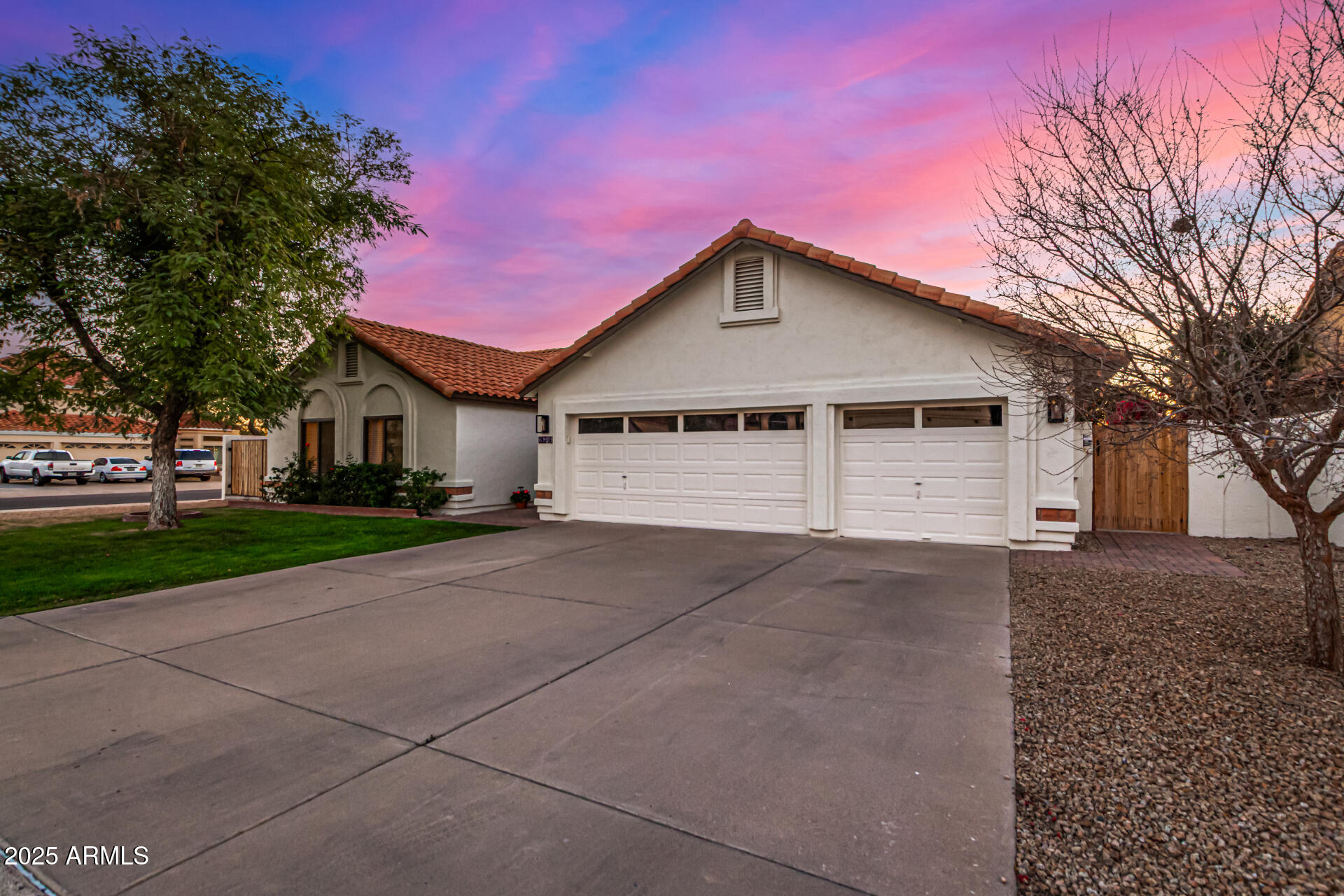 2646 North Robin Lane Mesa, AZ 85213 - Photo 2 of 45 a front view of a house with yard