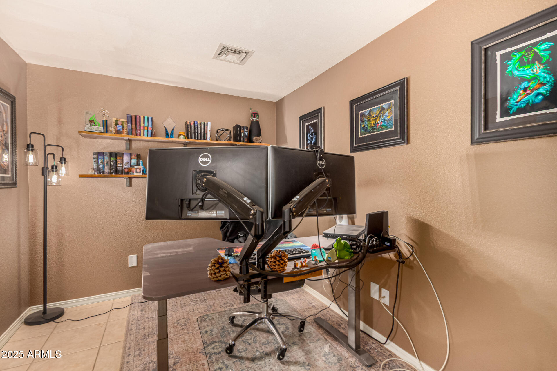 2646 North Robin Lane Mesa, AZ 85213 - Photo 30 of 45 a view of a workspace with furniture and a window