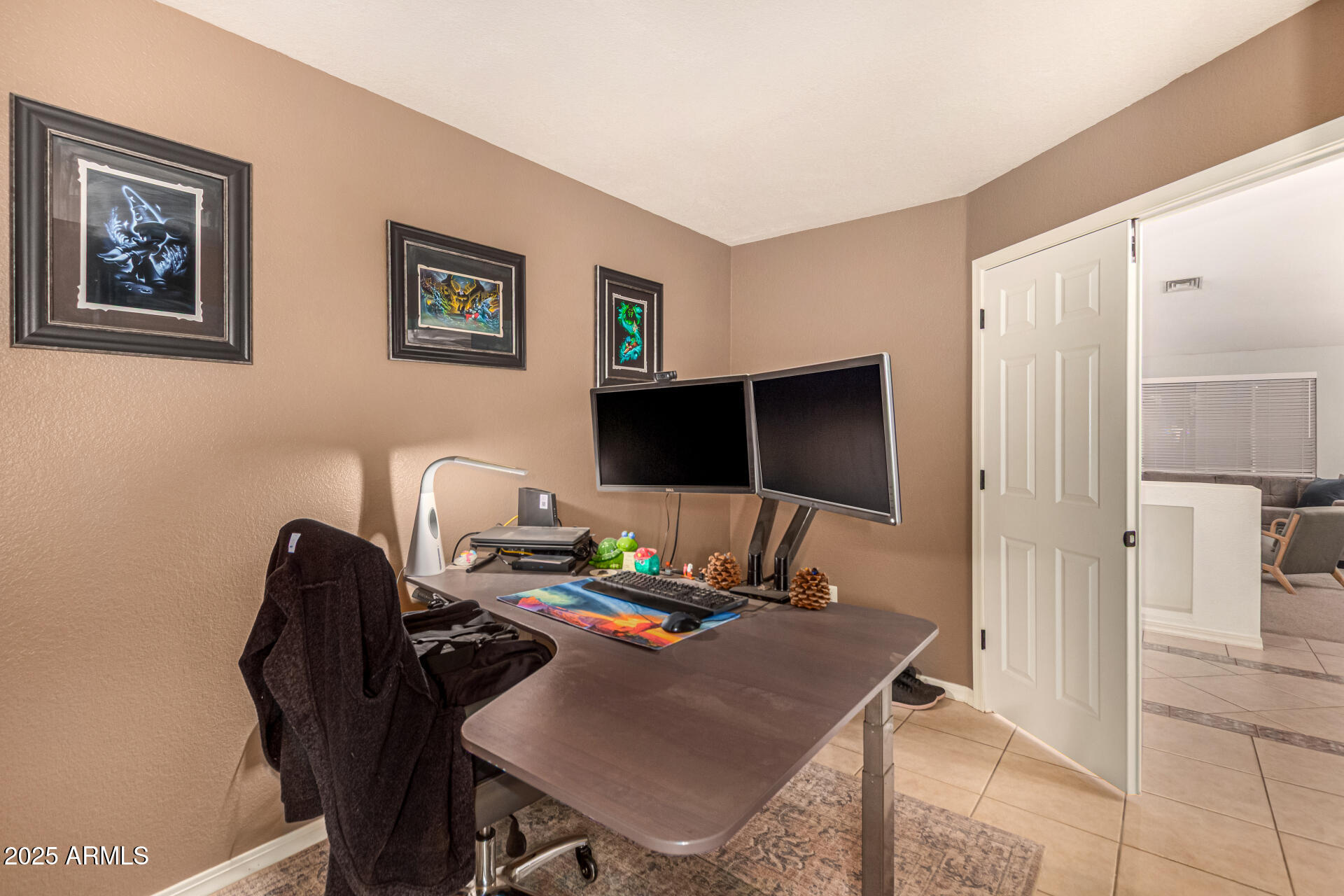 2646 North Robin Lane Mesa, AZ 85213 - Photo 31 of 45 a view of a workspace with furniture