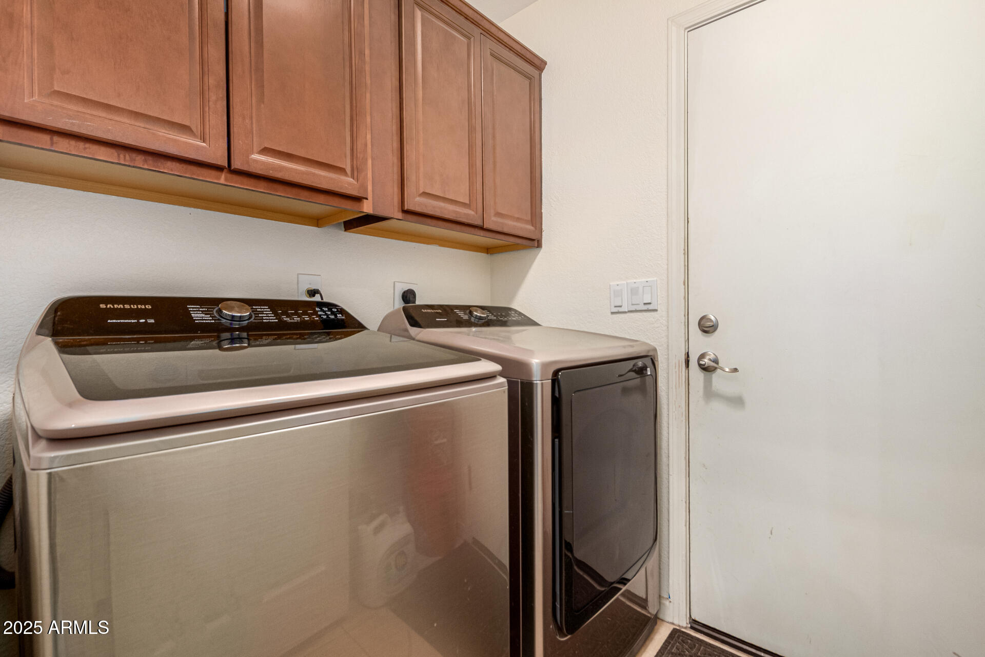 2646 North Robin Lane Mesa, AZ 85213 - Photo 33 of 45 a utility room with dryer and washer