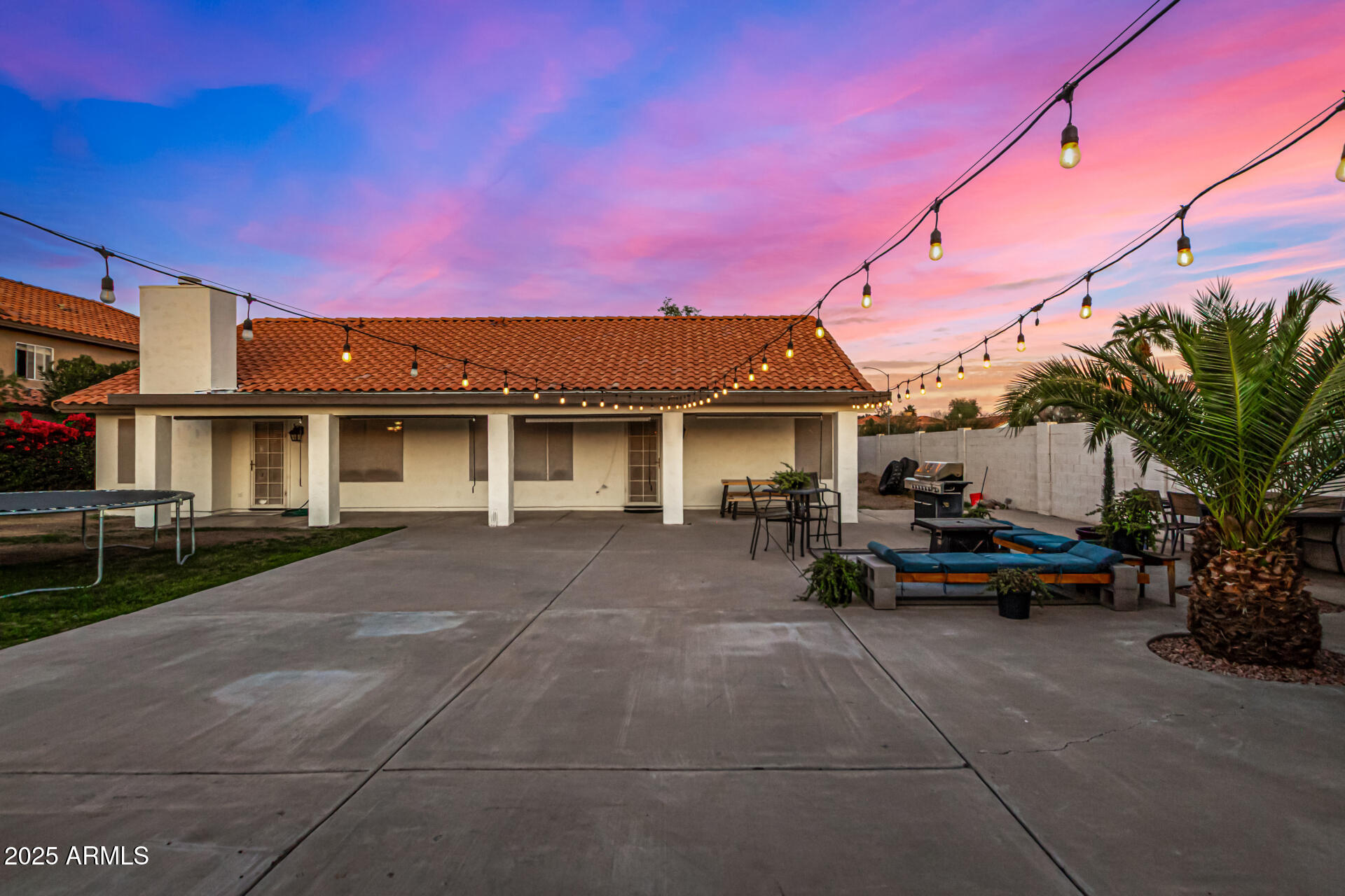 2646 North Robin Lane Mesa, AZ 85213 - Photo 37 of 45 a view of a house with a patio