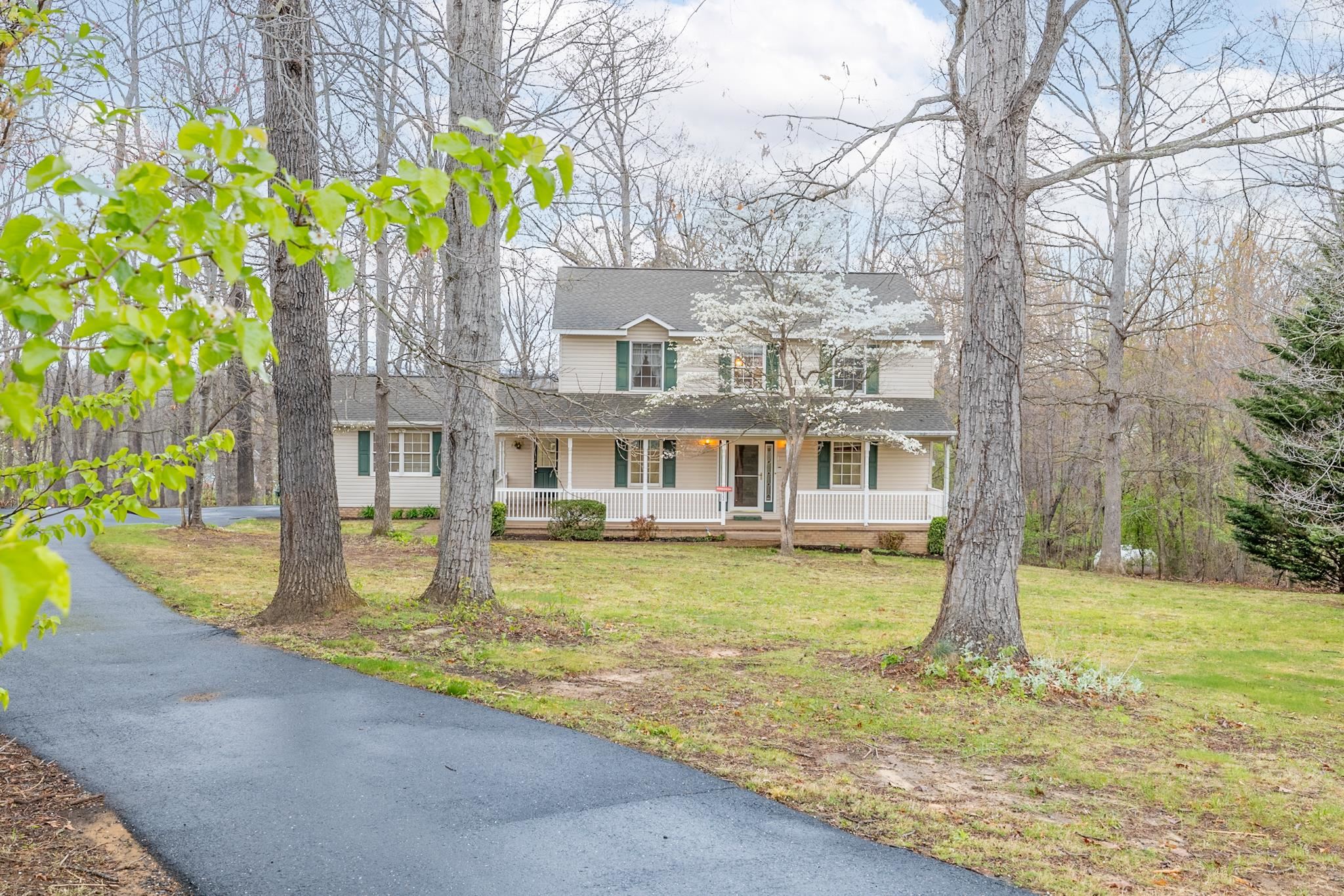 333 Cranberry Drive Stuarts Draft, VA 24477 - Photo 1 of 48 a front view of a house with swimming pool