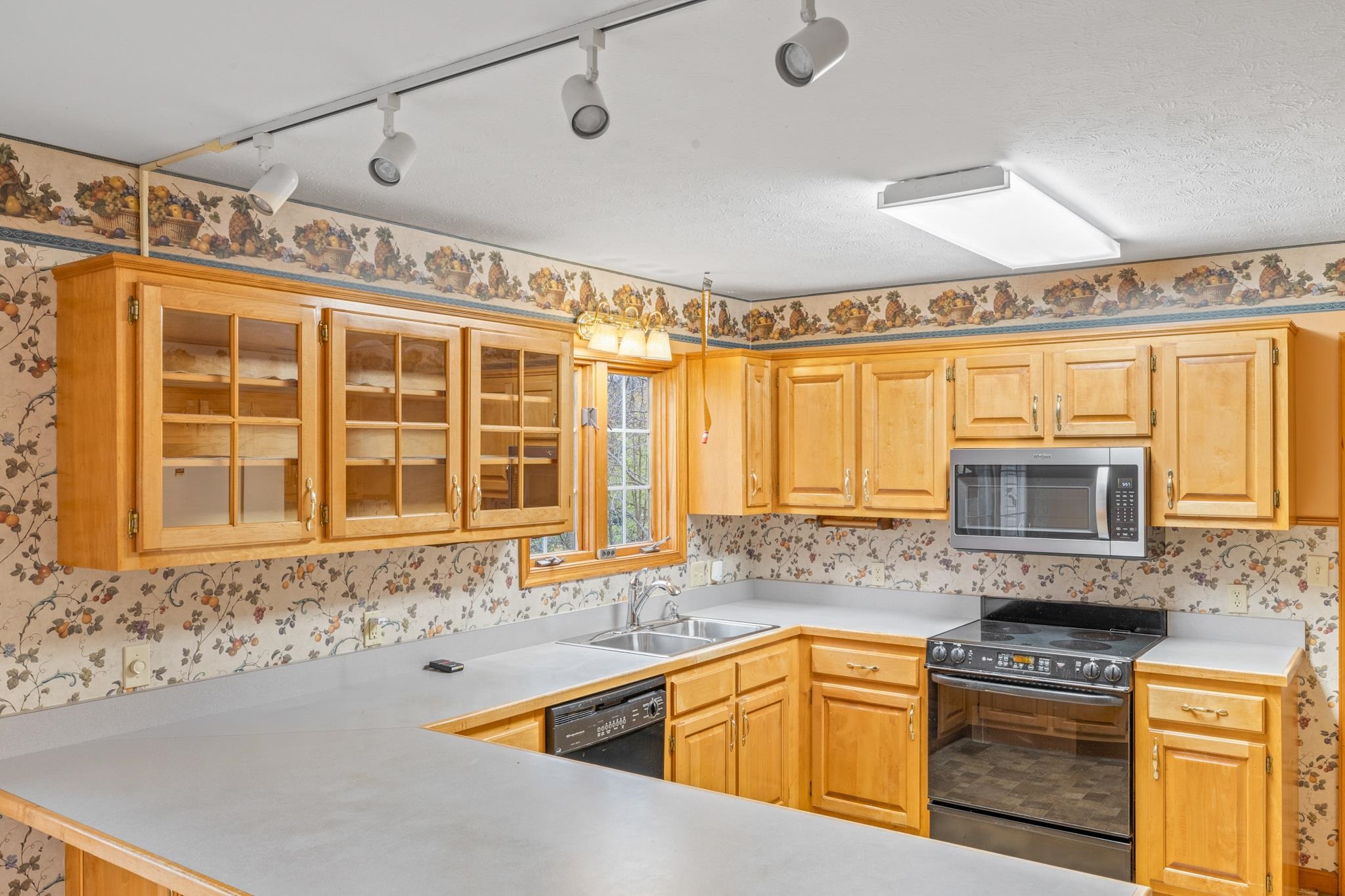 333 Cranberry Drive Stuarts Draft, VA 24477 - Photo 22 of 48 a kitchen with stainless steel appliances granite countertop a sink and a granite counter tops