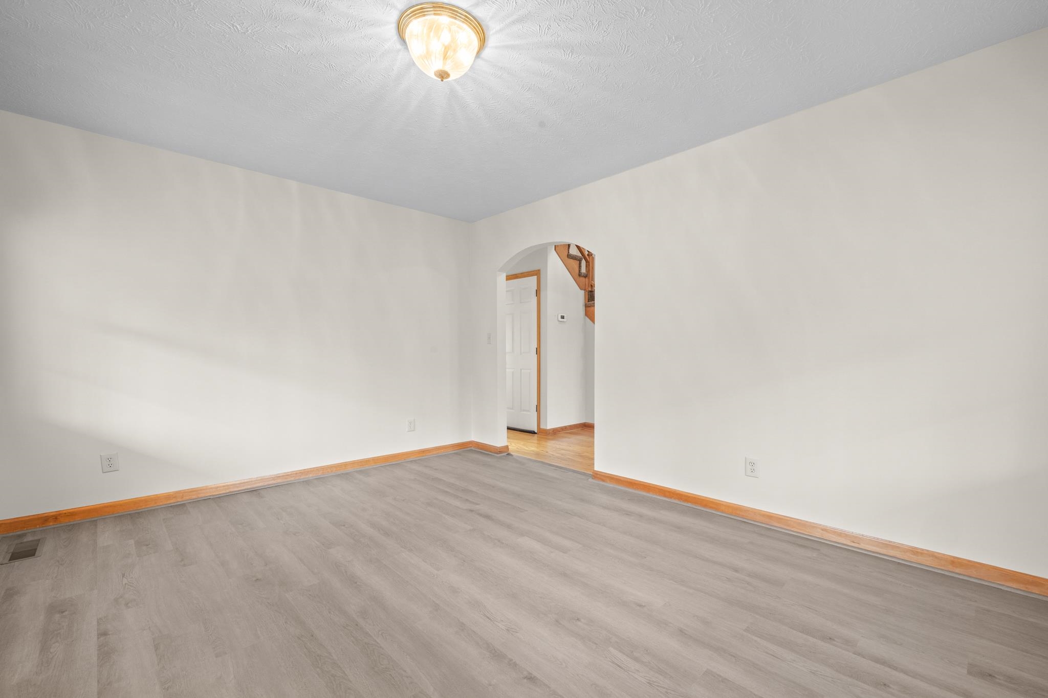 333 Cranberry Drive Stuarts Draft, VA 24477 - Photo 30 of 48 a view of empty room with wooden floor