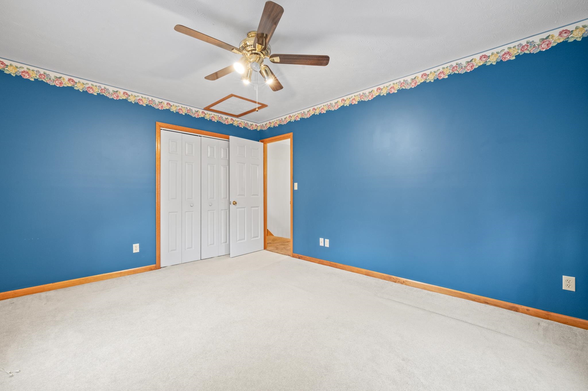 333 Cranberry Drive Stuarts Draft, VA 24477 - Photo 39 of 48 a view of an empty room with a chandelier fan
