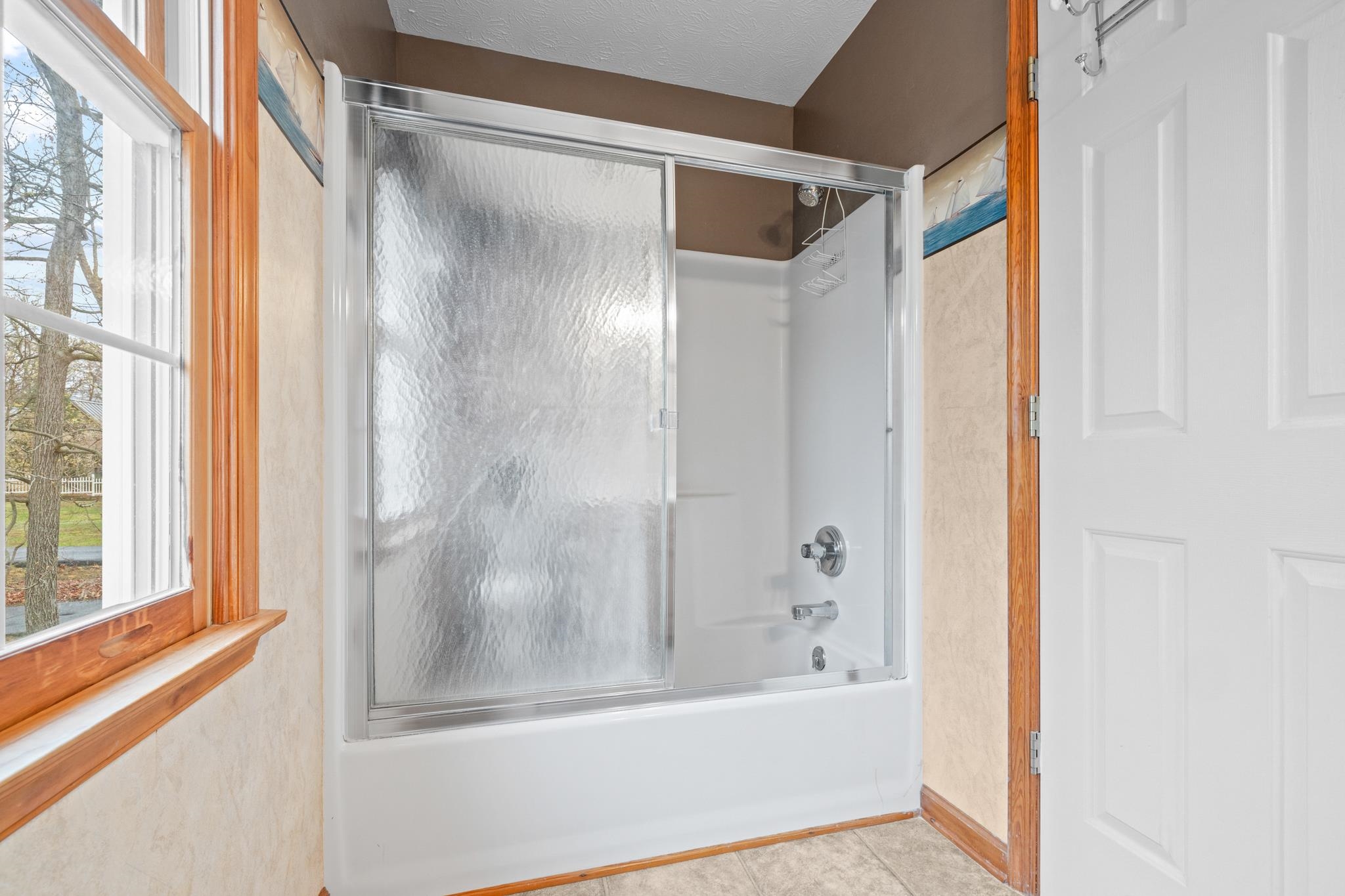 333 Cranberry Drive Stuarts Draft, VA 24477 - Photo 42 of 48 a bathroom with a bathtub and a shower