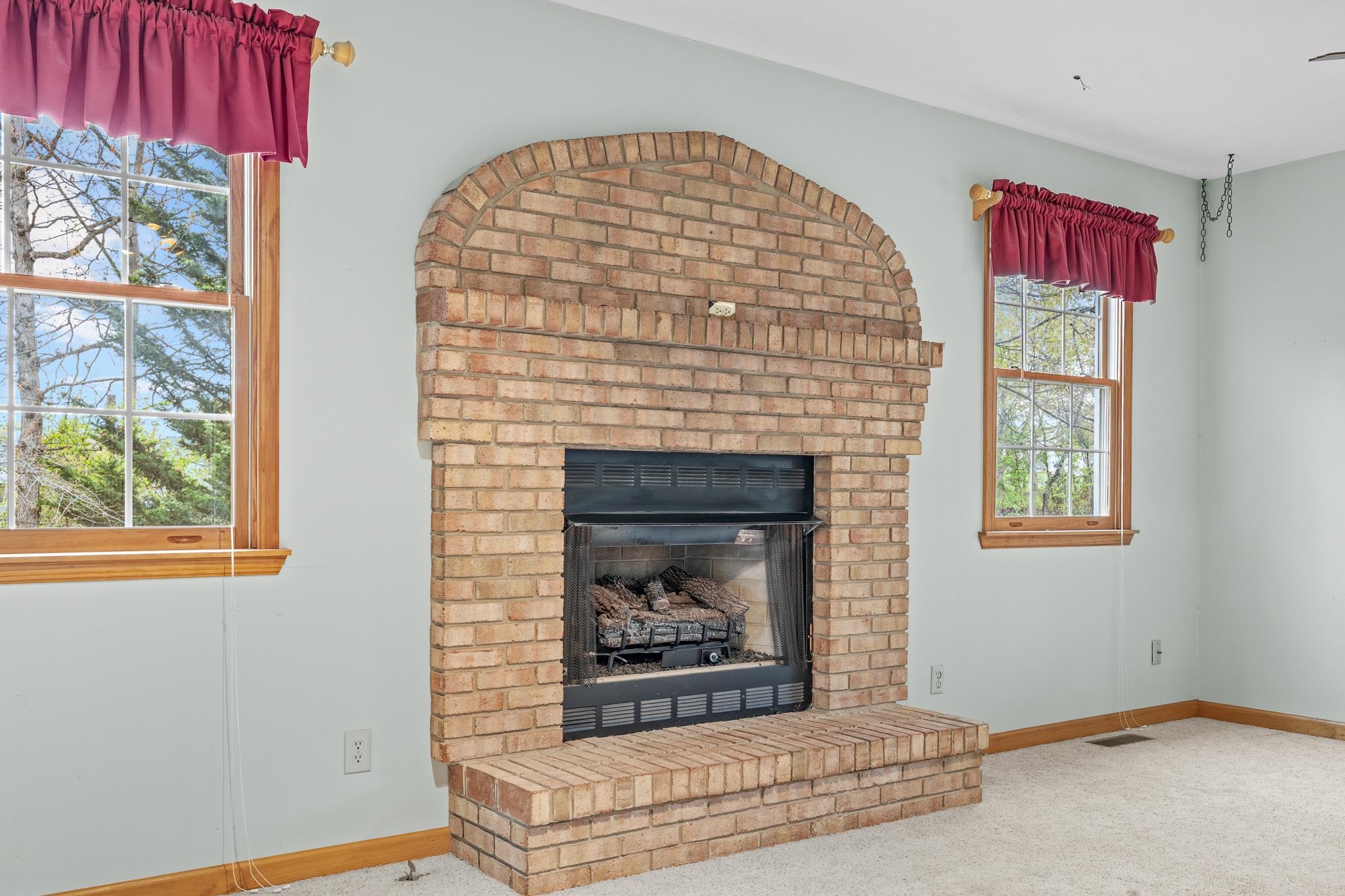 333 Cranberry Drive Stuarts Draft, VA 24477 - Photo 7 of 48 a living room with window and a fireplace