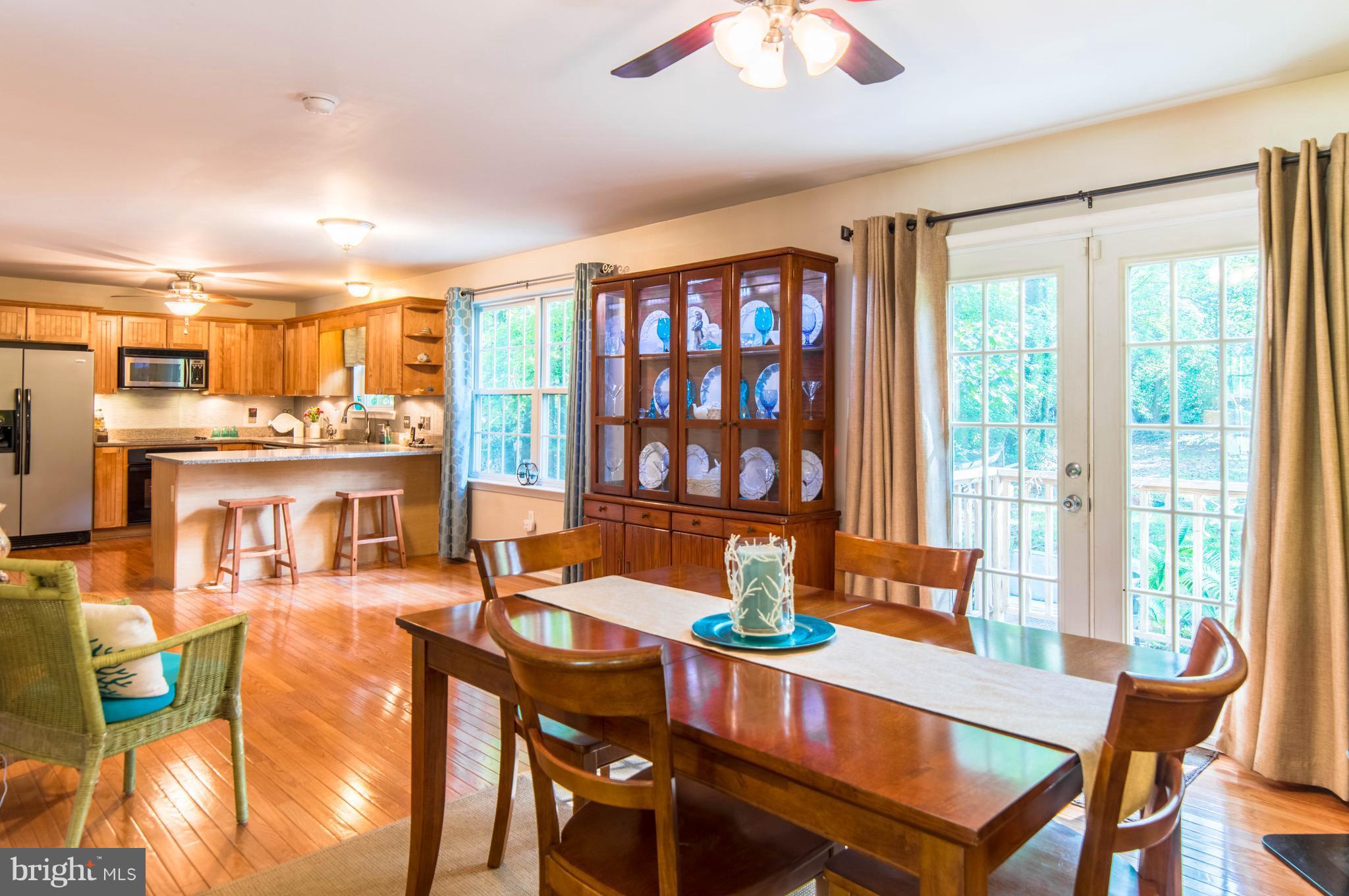 23460 Myrtle Point Road California, MD 20619 - Photo 14 of 27 Family Room has doors to patio