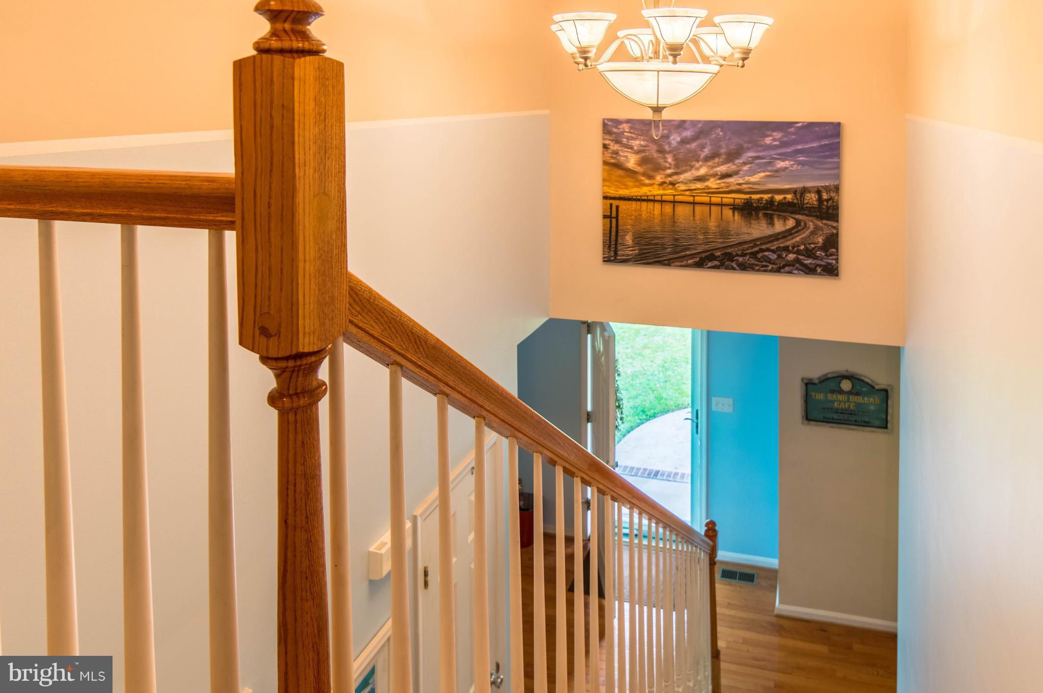 23460 Myrtle Point Road California, MD 20619 - Photo 19 of 27 Stairwell and foyer area