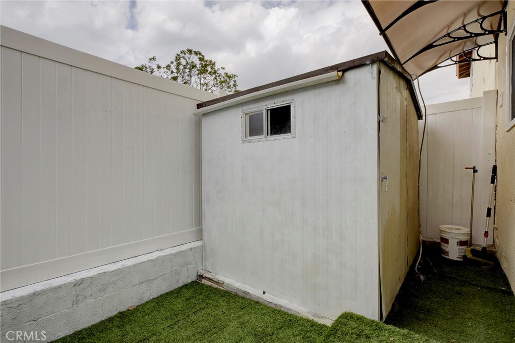 9917 Marcus Avenue, Unit 9917 Tujunga, CA 91042 - Photo 17 of 32 a bathroom with a shower and a mirror