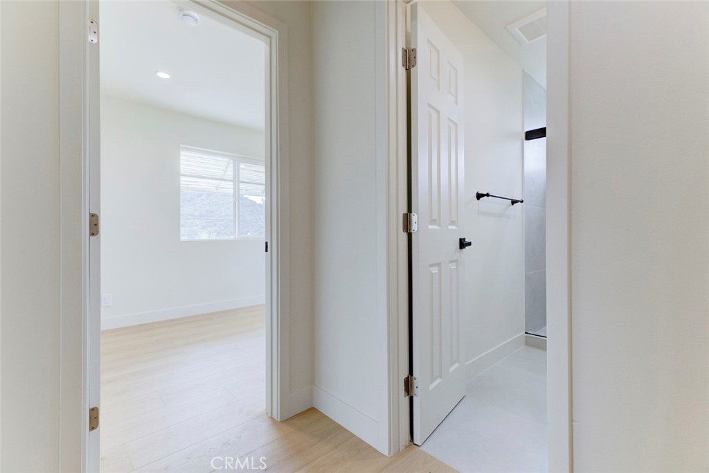 9917 Marcus Avenue, Unit 9917 Tujunga, CA 91042 - Photo 21 of 32 a view of a bathroom with mirror