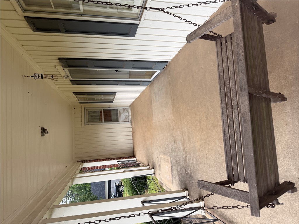 715 Concord Road Anderson, SC 29621 - Photo 8 of 24 A spacious covered porch offers an inviting retreat, perfect for relaxation.