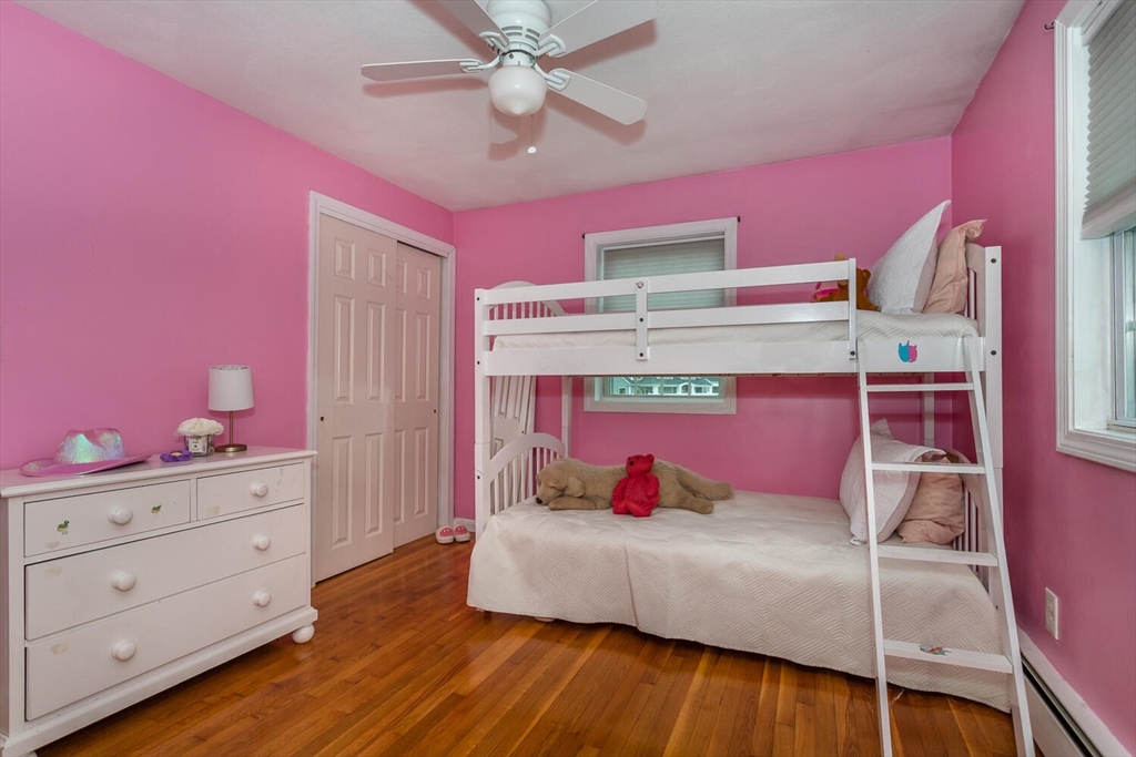 44 Kenney Street Canton, MA 02021 - Photo 9 of 16 a bedroom with a bed and a dresser