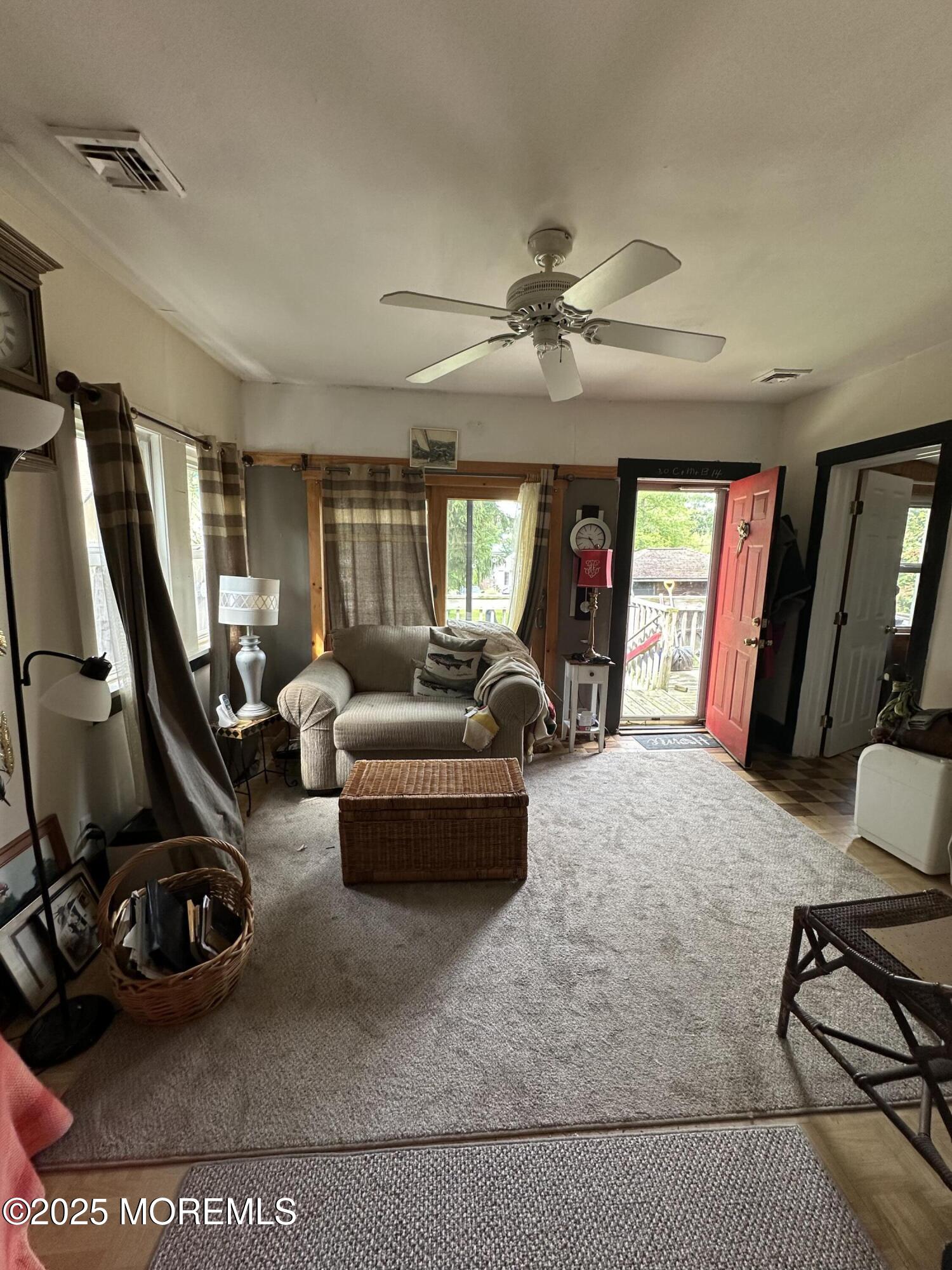 122 Hamilton Avenue Leonardo, NJ 07737 - Photo 11 of 16 a bed room with furniture a window and a flat screen tv