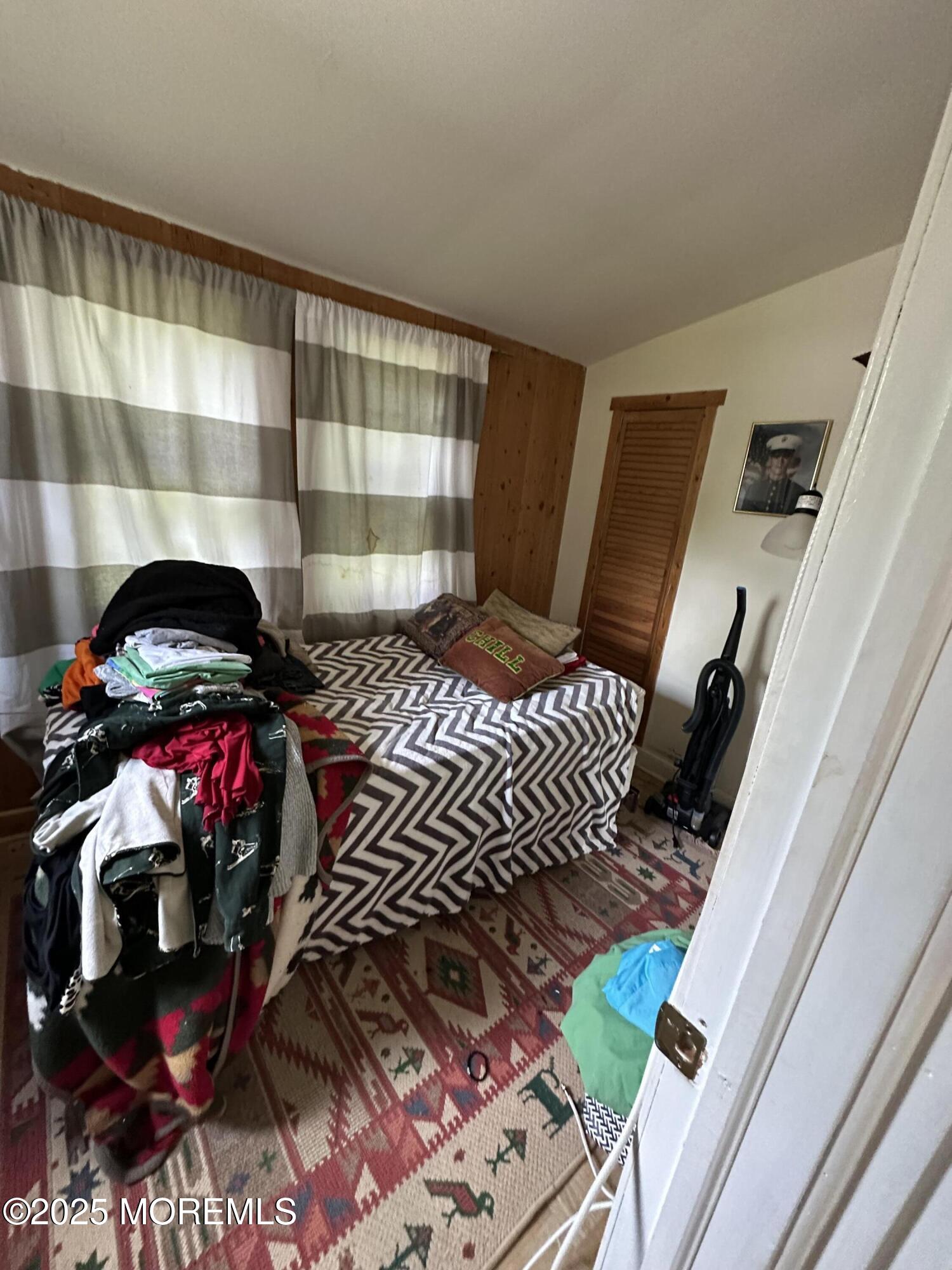 122 Hamilton Avenue Leonardo, NJ 07737 - Photo 15 of 16 a bedroom with a bed and a window