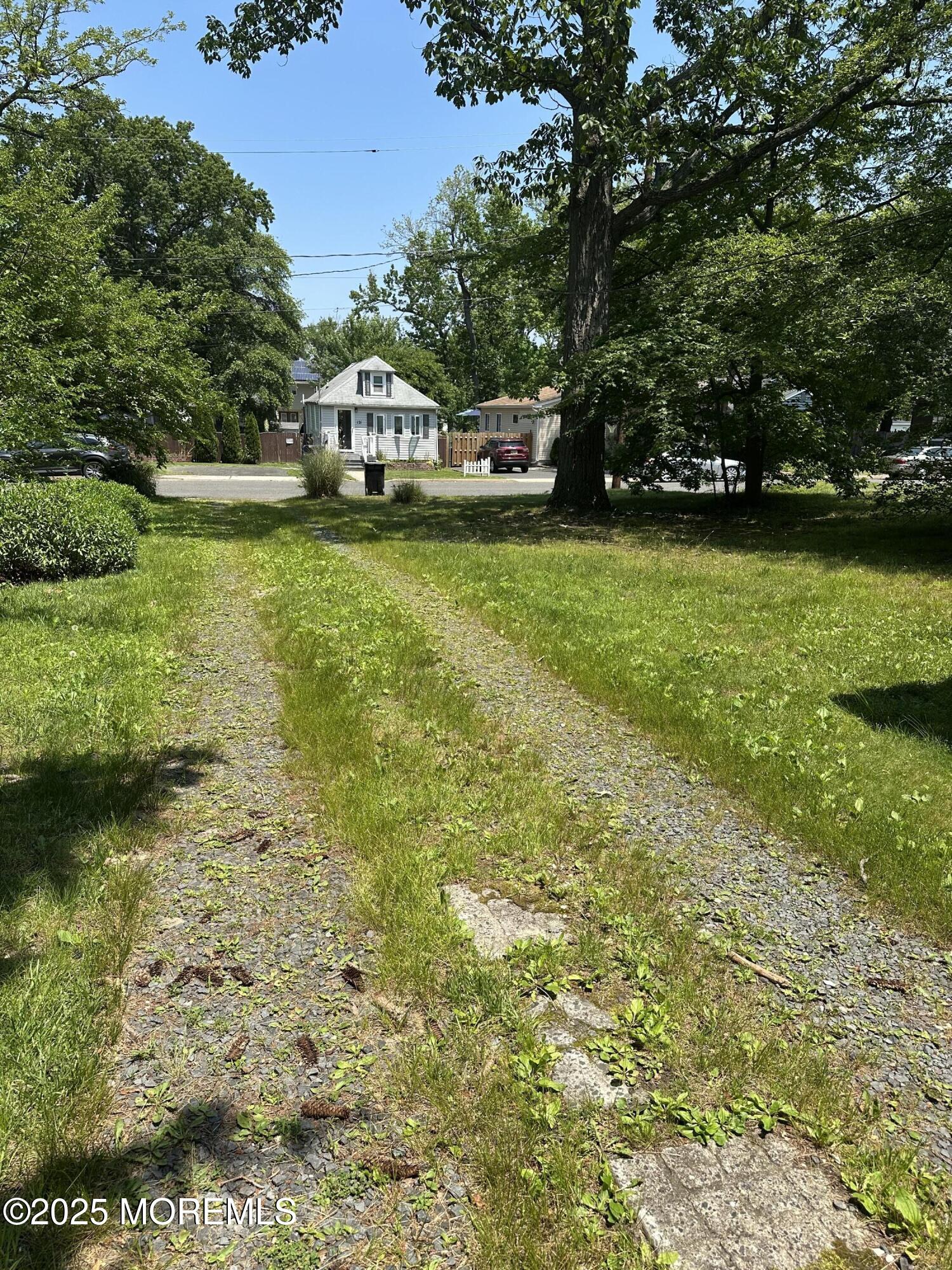 122 Hamilton Avenue Leonardo, NJ 07737 - Photo 2 of 16 a view of yard with swimming pool and green space