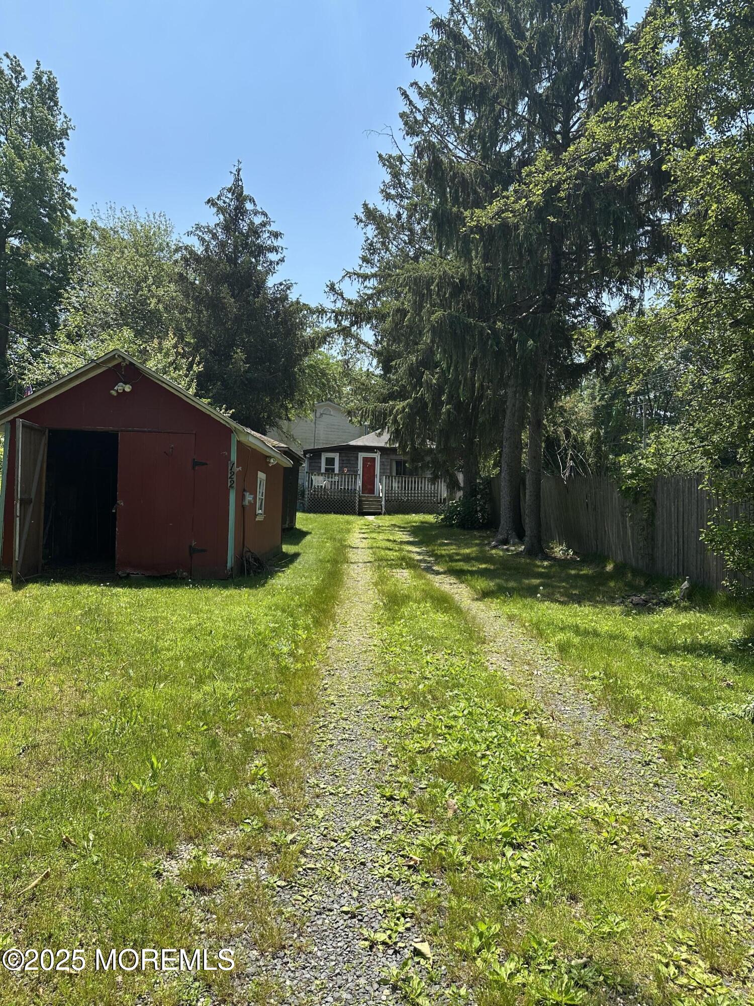 122 Hamilton Avenue Leonardo, NJ 07737 - Photo 5 of 16 a house view with a garden space