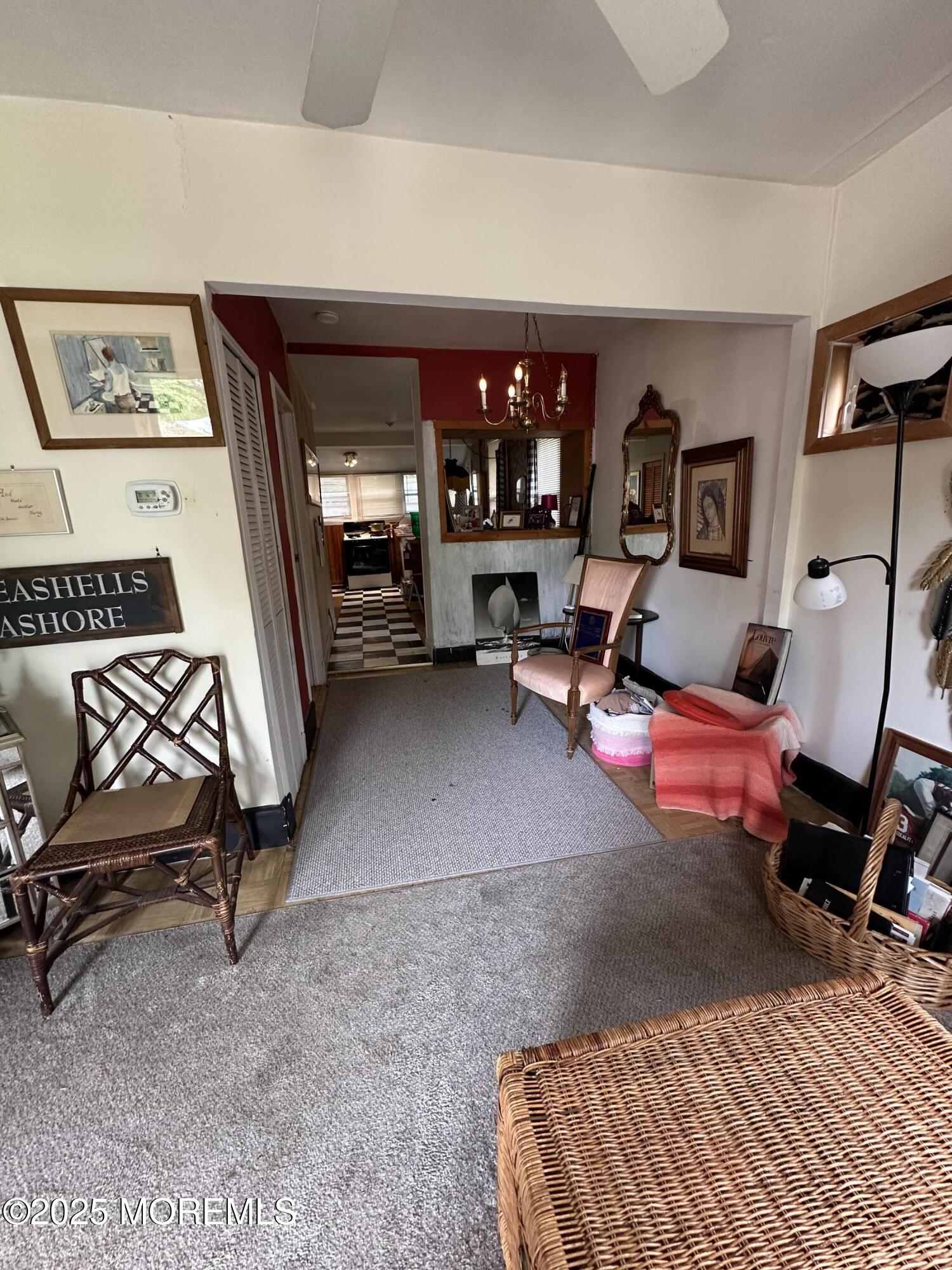 122 Hamilton Avenue Leonardo, NJ 07737 - Photo 8 of 16 a bedroom with furniture and a lamp