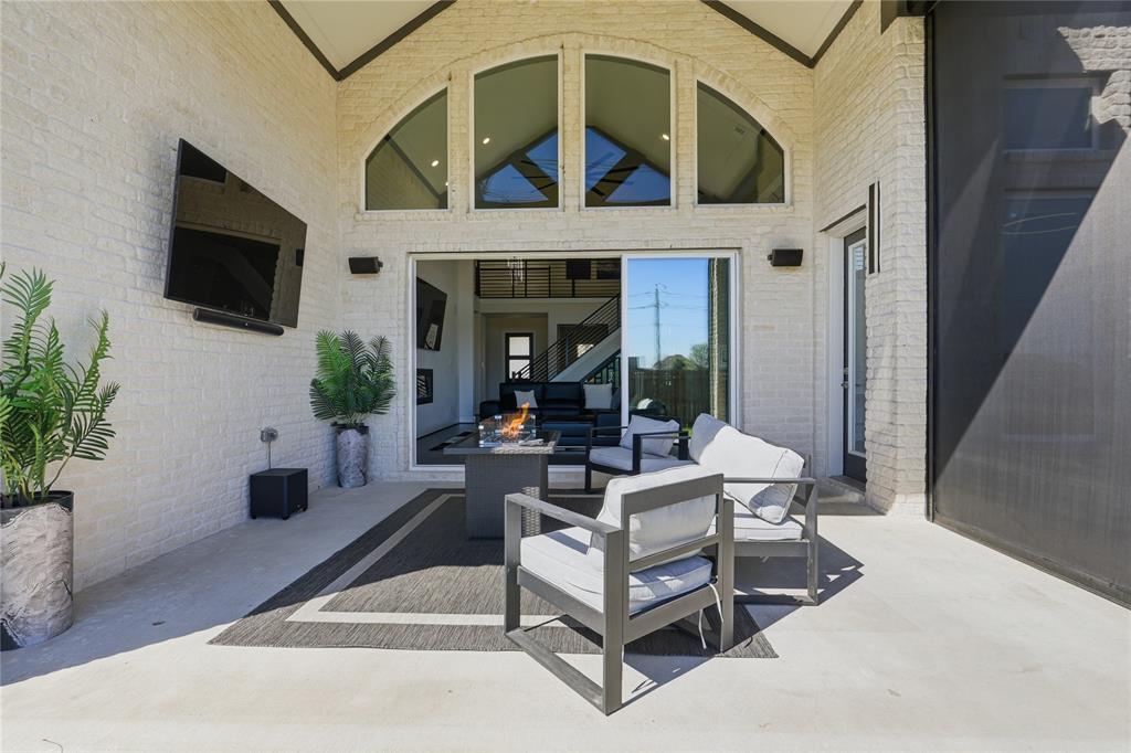 7548 Ridge Lane Grand Prairie, TX 75054 - Photo 34 of 35 View of patio / terrace featuring outdoor furniture
