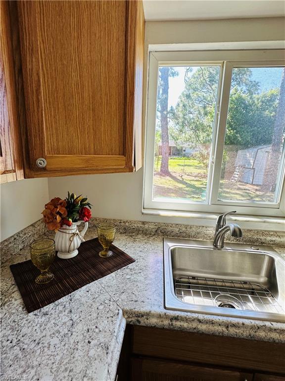 19040 Tampa Road South Fort Myers, FL 33967 - Photo 13 of 23 a kitchen with a sink and a window