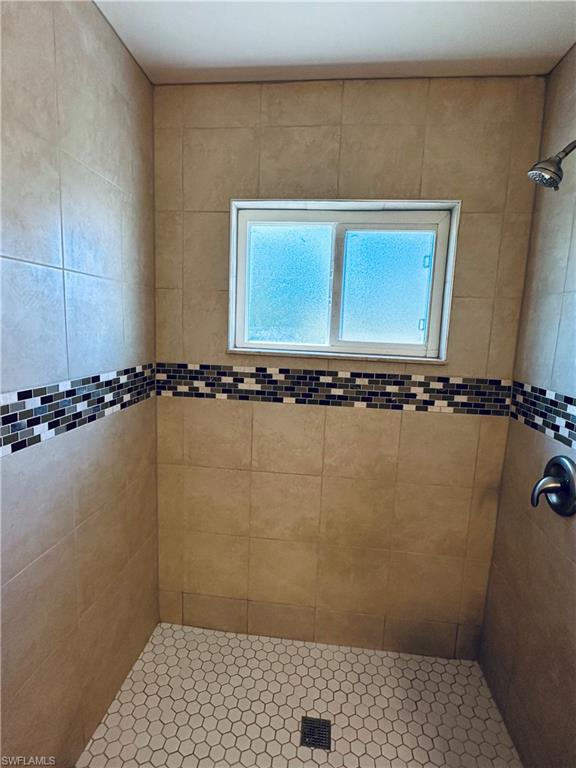 19040 Tampa Road South Fort Myers, FL 33967 - Photo 20 of 23 a bathroom with a window