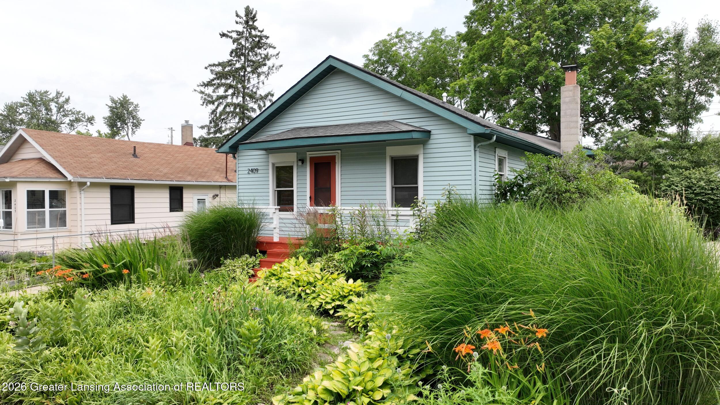2409 Alpha Street Lansing, MI 48910 - Photo 32 of 46 Right Side Front