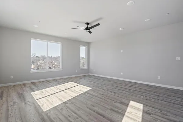 a view of a livingroom with a dishwasher and cabinets