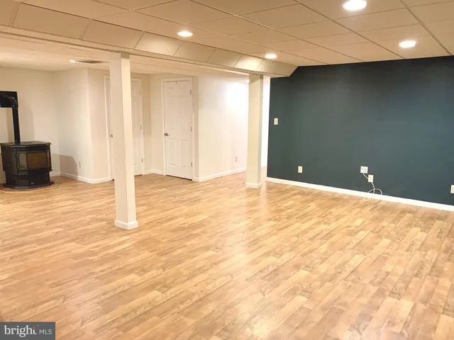 a view of a livingroom with wooden floor