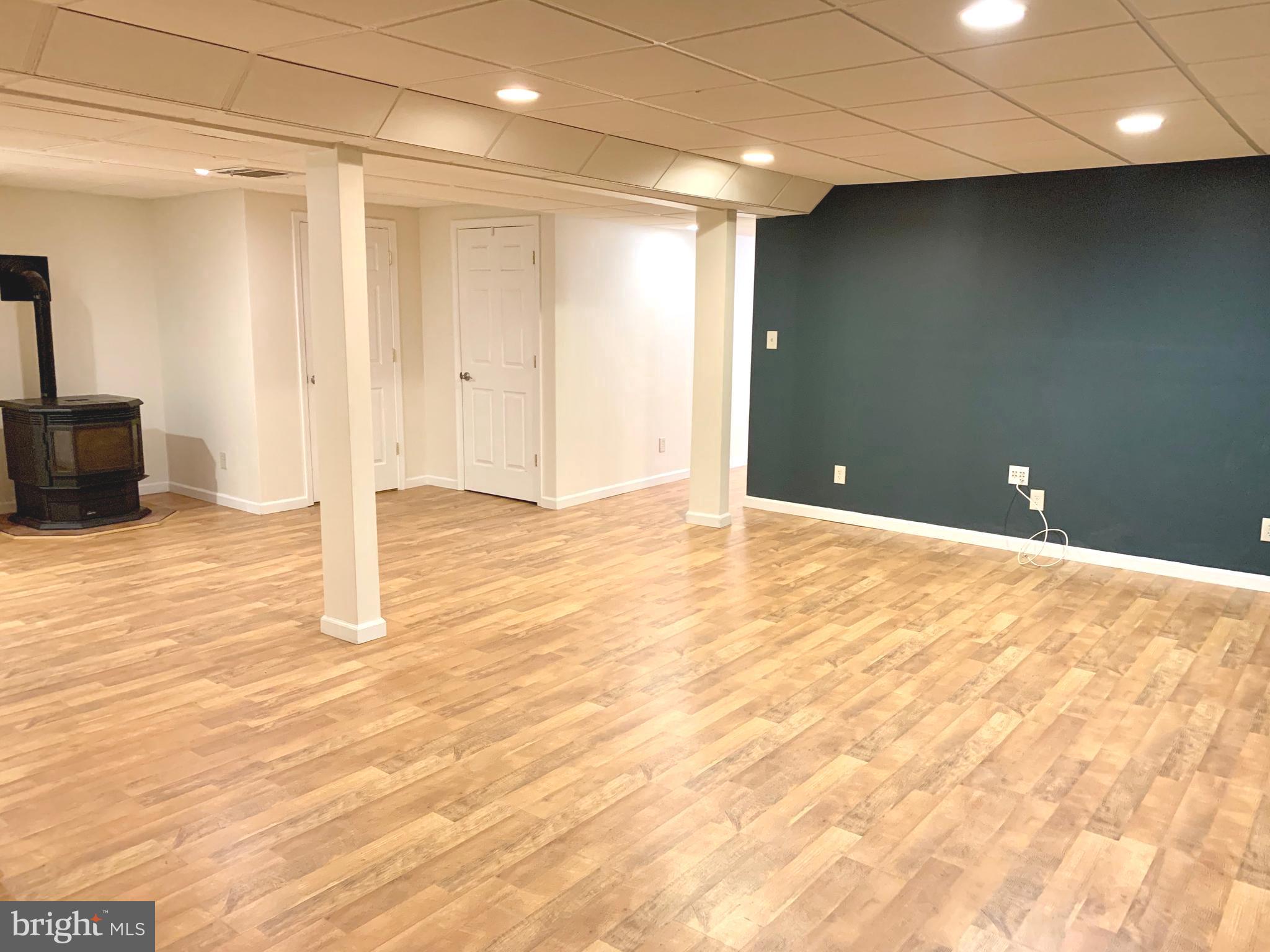 808 207th Street Pasadena, MD 21122 - Photo 19 of 20 a view of a livingroom with wooden floor
