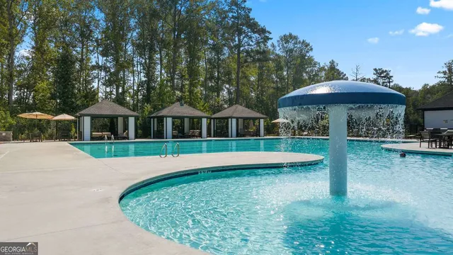 a view of an chairs and tables in the patio