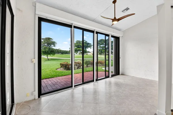a kitchen with stainless steel appliances a refrigerator sink and microwave