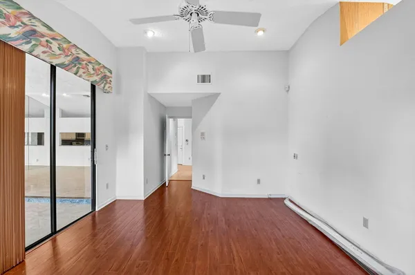 a view of a hallway with a chandelier