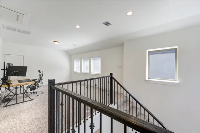 a view of livingroom with furniture and windows