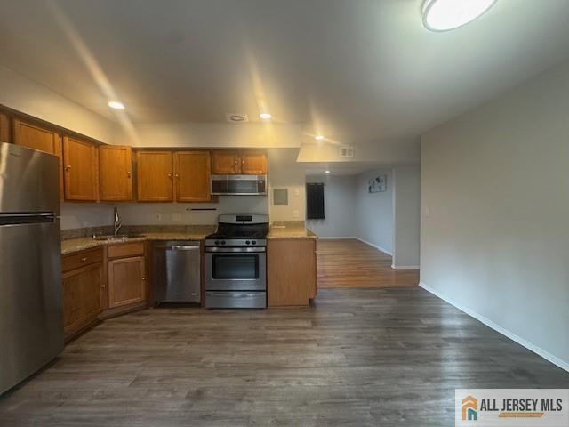 37 Judson Street Edison, NJ 08837 - Photo 11 of 11 a kitchen with stainless steel appliances a refrigerator and a stove top oven