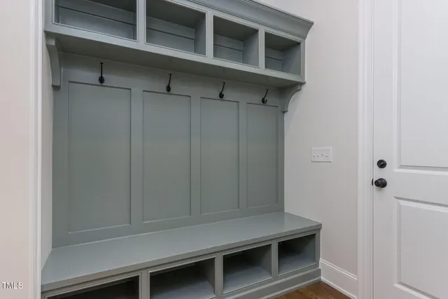 a bathroom with a sink and cabinets