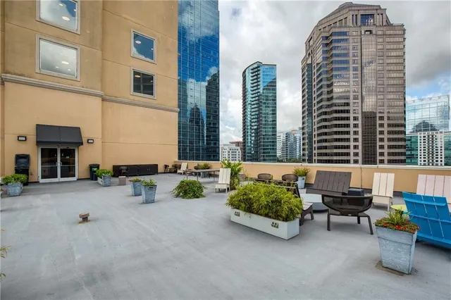 a view of a building with a yard