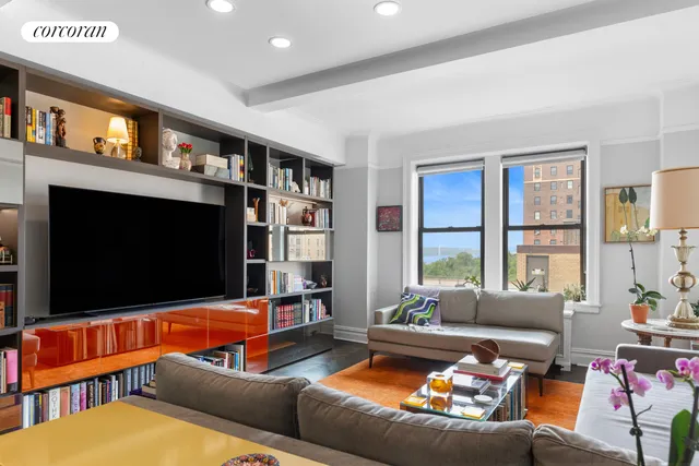a living room with furniture fireplace and a flat screen tv