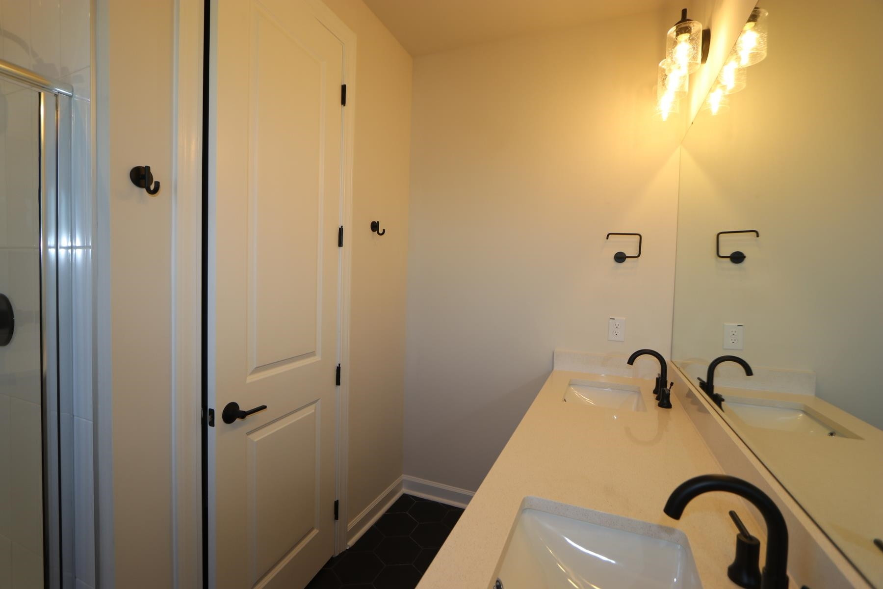 716 Icarus Lane Wake Forest, NC 27587 - Photo 4 of 5 a bathroom with a sink and mirror