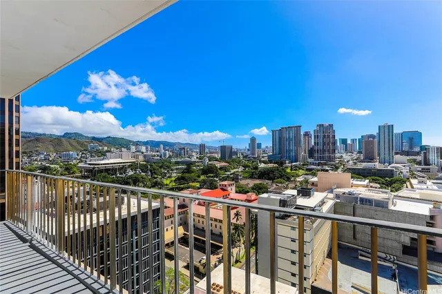 a city view from a balcony with city view