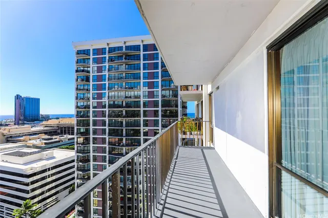 a view of balcony with wooden floor and windows