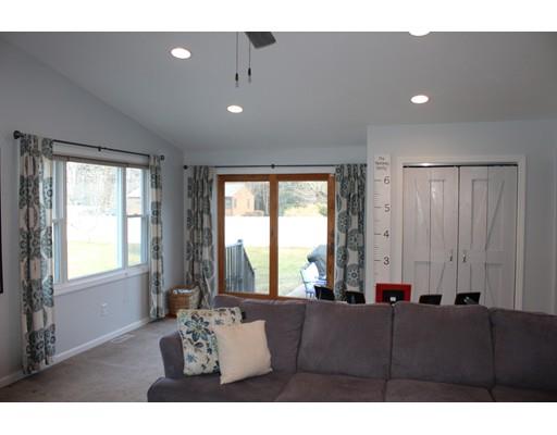 1 Wenzell Road Ashland, MA 01721 - Photo 13 of 20 a living room with furniture and a large window