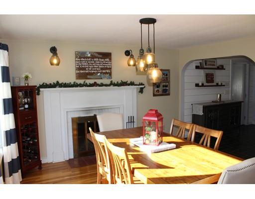 1 Wenzell Road Ashland, MA 01721 - Photo 15 of 20 a view of a dining room with furniture and chandelier