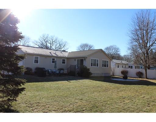 1 Wenzell Road Ashland, MA 01721 - Photo 6 of 20 a front view of a house with a yard and garage