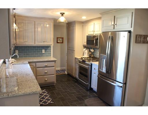 1 Wenzell Road Ashland, MA 01721 - Photo 7 of 20 a kitchen with granite countertop a refrigerator and a sink