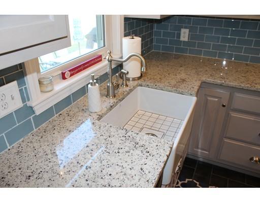 1 Wenzell Road Ashland, MA 01721 - Photo 8 of 20 a kitchen with a sink and a stove