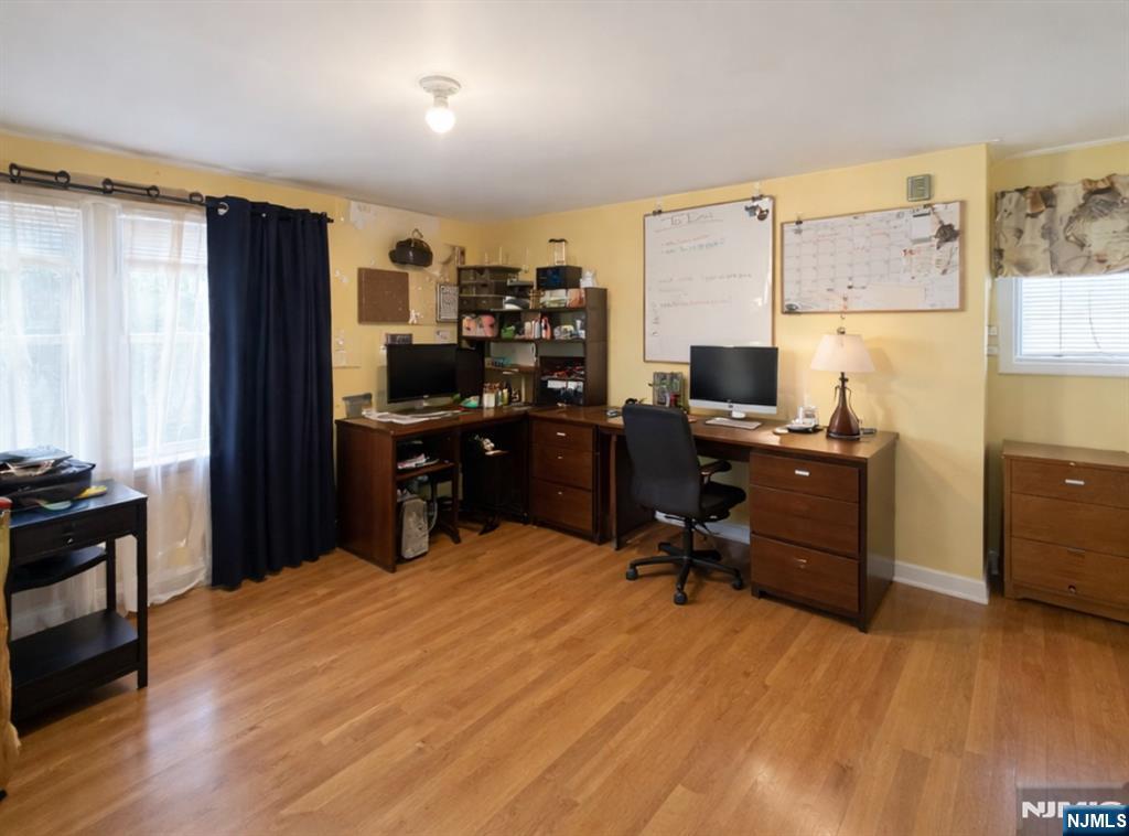 157 Harrington Road Clifton, NJ 07012 - Photo 4 of 9 a room with a workspace