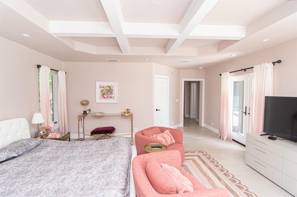 8208 Twin Lake Drive Boca Raton, FL 33496 - Photo 23 of 53 a bedroom with furniture and a flat screen tv