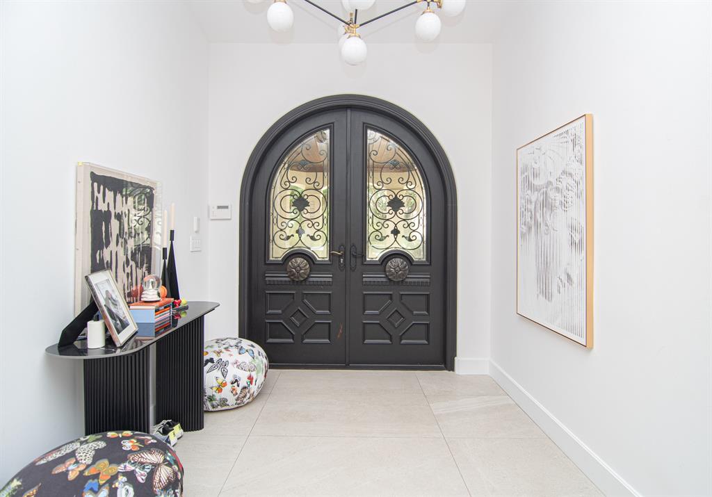 8208 Twin Lake Drive Boca Raton, FL 33496 - Photo 3 of 53 a view of a livingroom with wooden floor and a window