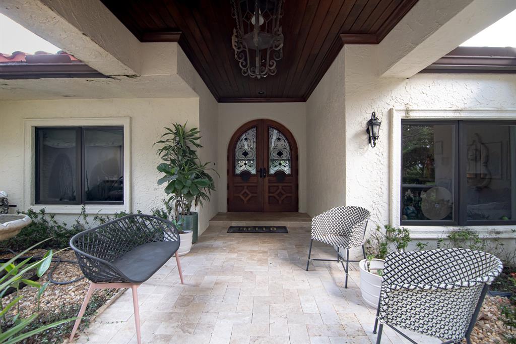 8208 Twin Lake Drive Boca Raton, FL 33496 - Photo 45 of 53 a living room with furniture and a rug